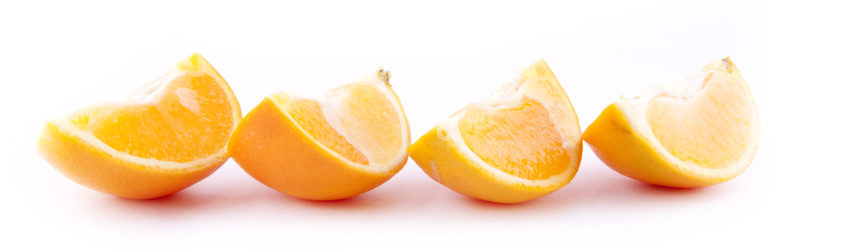 Extreme close-up image of an orange studio isolated on white background